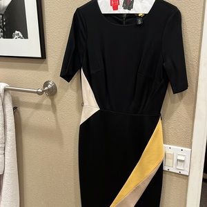 Closet clearance! Stunning black dress with pops of color to really stand out